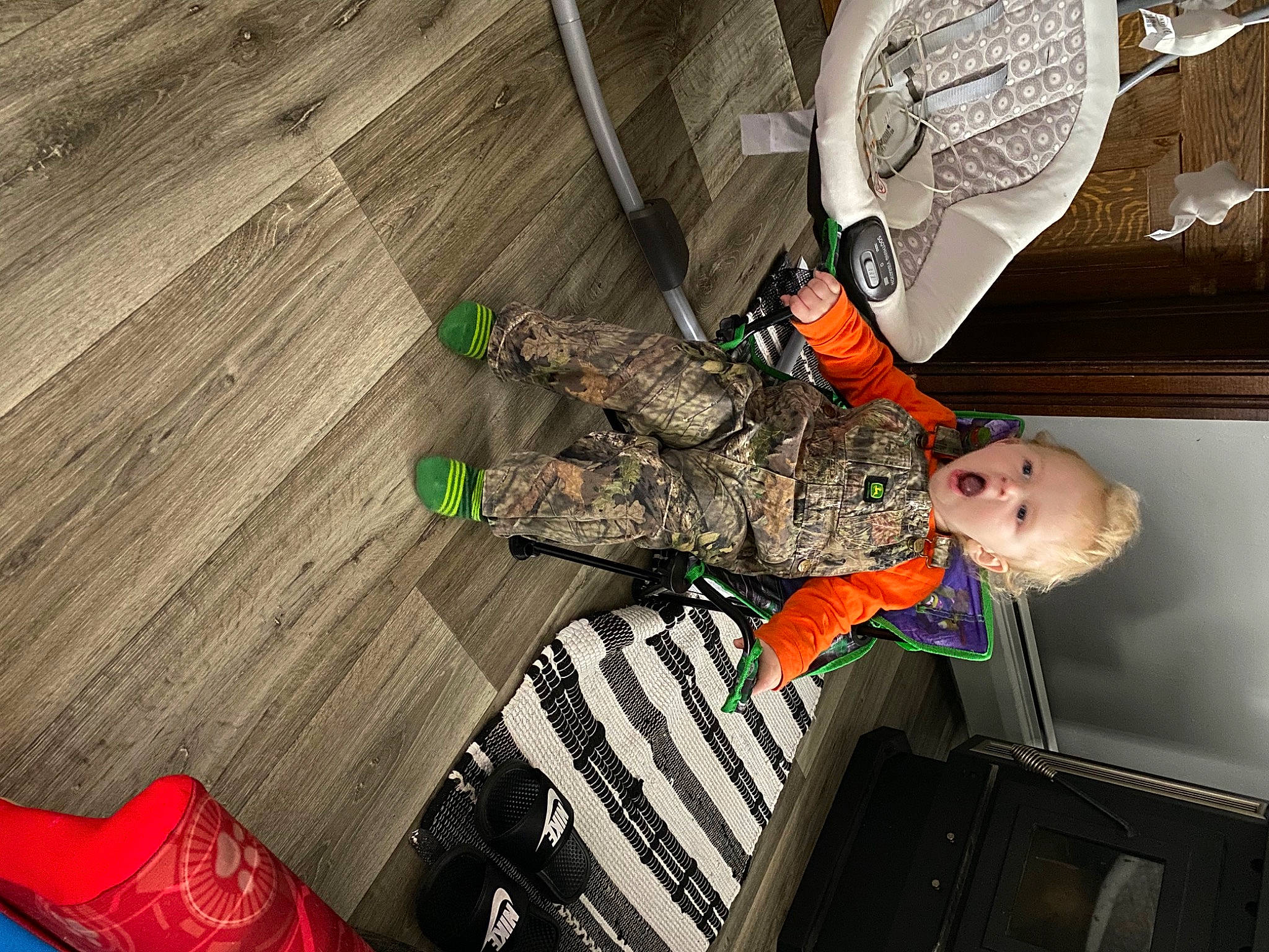 Keegan joined the competition — help win amazing prizes! army, boot, camouflage, carmine, flooring, fun, hardwood, hat, laminate_flooring, military, military_camouflage, pattern, person, personal_protective_equipment, room, sitting, soldier, surprise, thigh, wood