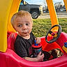 Odin joined the competition — help win amazing prizes! blond_hair, casual_clothing, child, drinking, driveway, facial_expression, grass, outdoor, pickup_truck, plastic_toy, playtime, portrait, seat, sippy_cup, steering_wheel, suburban_house, sunlight, toddler, toy_car, wheel