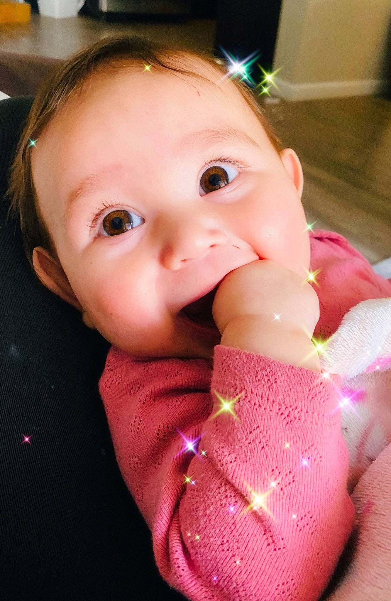 Solara is registered to the contest to win money with this photo: baby, baby_products, baby_toddler_clothing, cheek, chest, child, eyelash, fun, gesture, lip, magenta, mouth, nail, nose, pattern, person, pink, skin, thumb, toddler