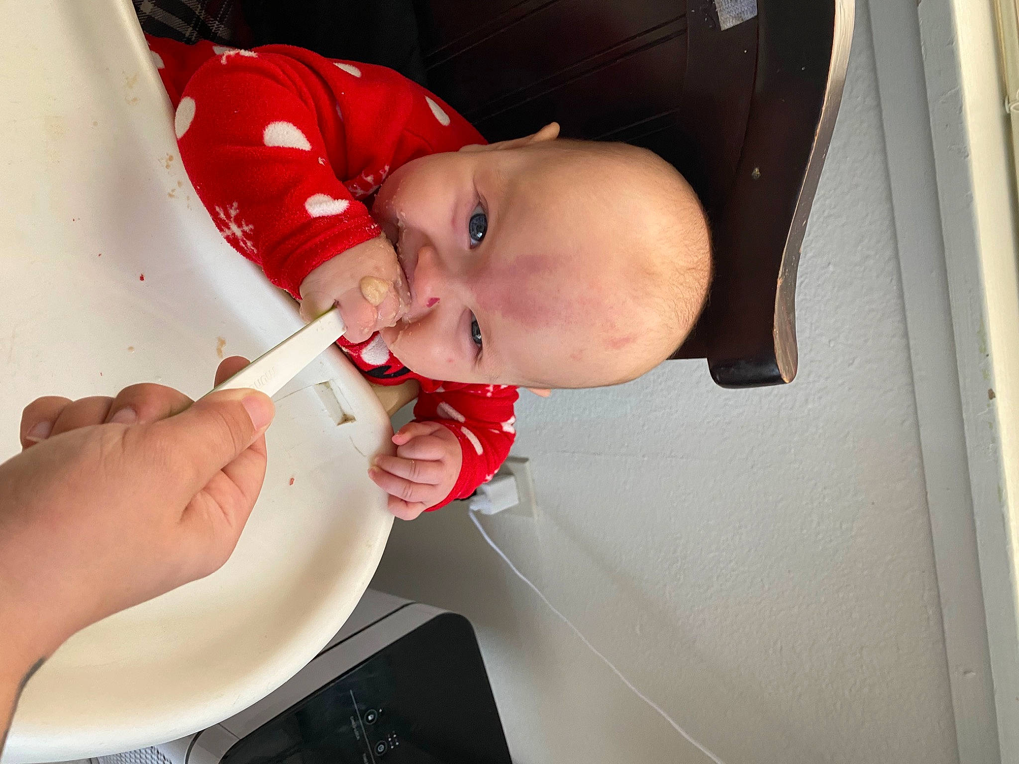 Leilani is registered to the contest to win money with this photo: baby, baby_food, baby_products, baby_toddler_clothing, carmine, child, drinkware, eyelash, finger, hand, lip, mouth, nail, nose, person, skin, smile, spoon, tableware, thumb