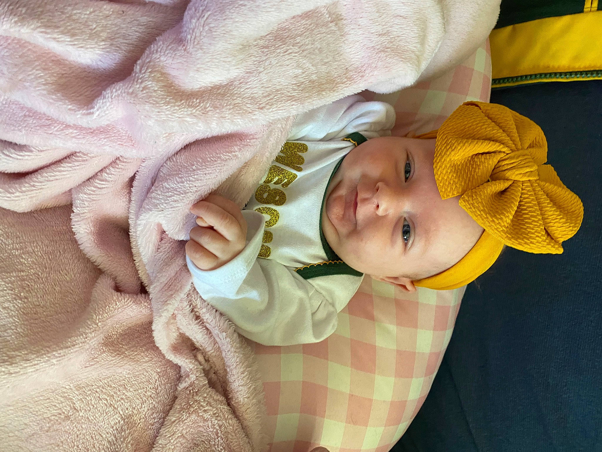 Mckenna is registered to the contest to win money with this photo: baby, baby_products, baby_toddler_clothing, child, comfort, finger, happy, hat, linens, pattern, person, skin, sleep, sleeve, smile, textile, toddler, tree