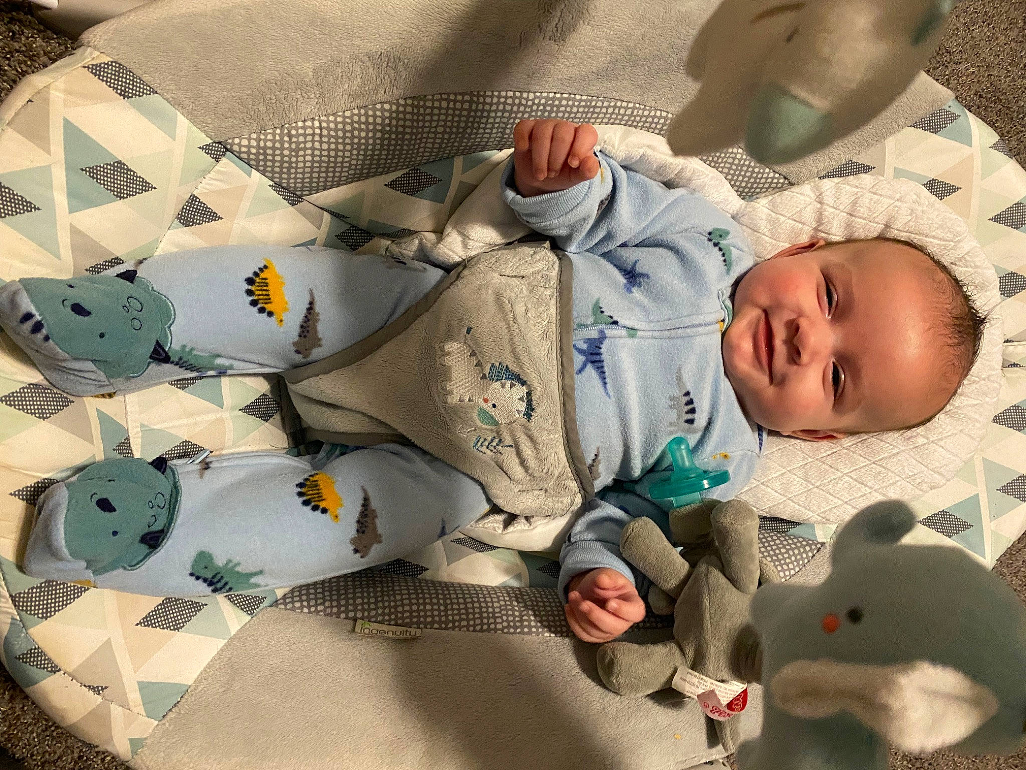Liam is registered to the contest to win money with this photo: baby, baby_products, baby_safety, baby_sleeping, baby_toddler_clothing, bedding, bedtime, child, comfort, joy, linens, mammal, pattern, person, photograph, product, room, sleeve, textile, toddler
