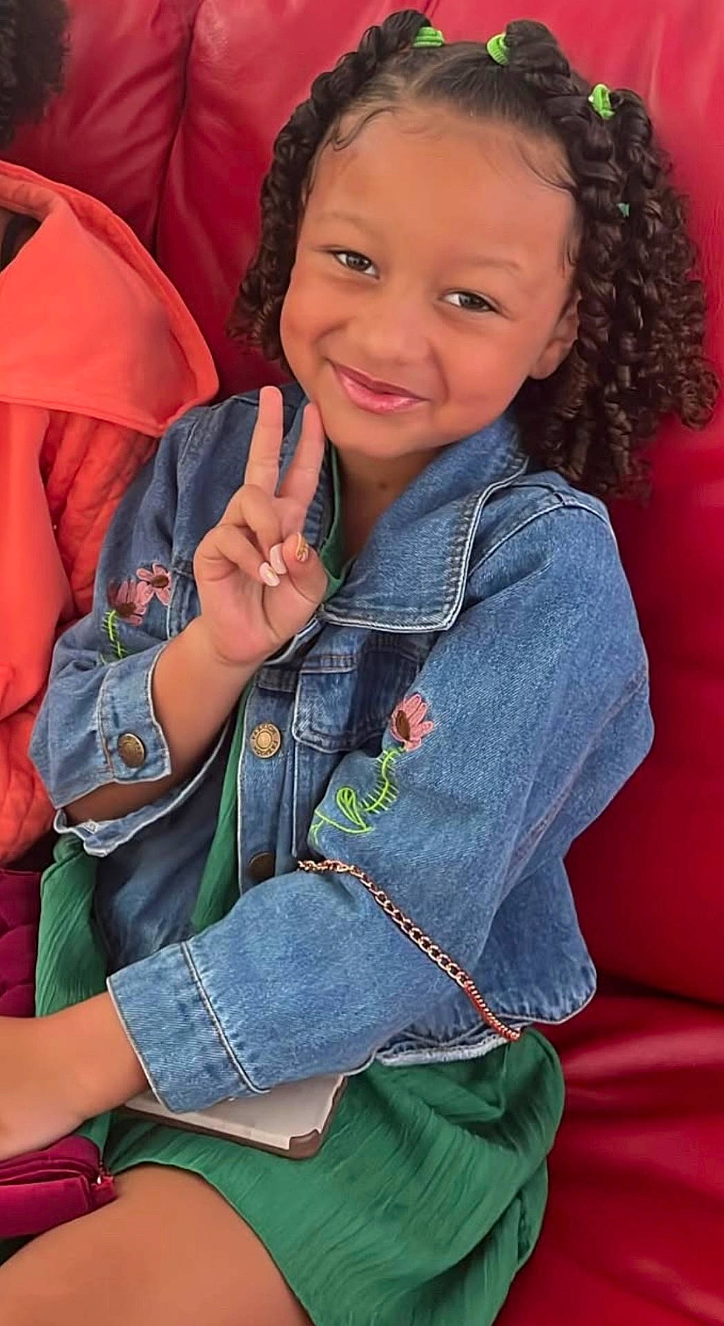 Ashlynn joined the competition — help win amazing prizes! blackhair, braid, child, clothing, coat, curlyhair, dimples, face, female, girl, hair, happy, head, jacket, person, sitting, sleeve, smile