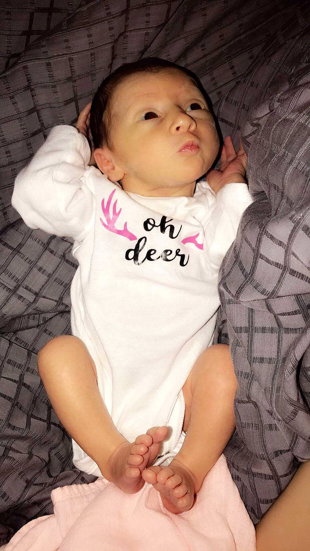 Hadlee is registered to the contest to win money with this photo: arm, baby, baby_products, baby_toddler_clothing, cheek, child, child_model, leg, person, pink, skin, sleeve, toddler