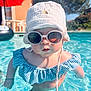 baby, sunglasses, hat, pool, water, swimsuit, child, sunny, outdoor, summer, blue, striped, person, holding, umbrella, sunhat, fashion, cute, face, swimming