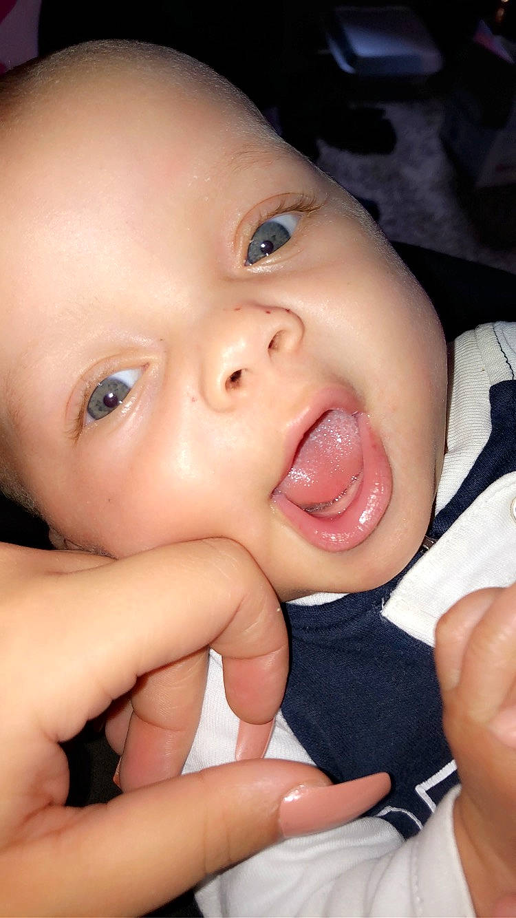 Jakari Swindell is registered to the contest to win money with this photo: baby, beauty, cheek, child, chin, close_up, eye, eyebrow, face, facial_expression, finger, forehead, hand, head, lip, mouth, nail, nose, person, skin