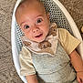 Ovi joined the competition — help win amazing prizes! baby, infant, basket, bib, overalls, clothing, carpet, floor, person, child, cute, smiling, indoors, portrait, happy, skin, head, eyes, hand, seated