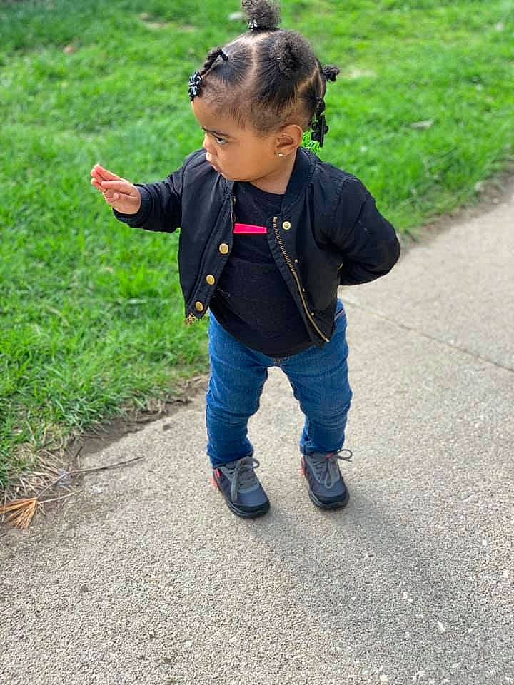 Amore is registered to the contest to win money with this photo: child, denim, fun, grass, jacket, jeans, outerwear, person, play, shoe, toddler, walking