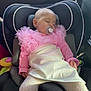 baby, infant, child, sleeping, car_seat, pacifier, pink_clothing, tulle, dress, tights, earring, headrest, car_interior, window, outside_landscape, daylight, nap, soft_toys, upholstery, seat