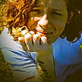 Haliy J.