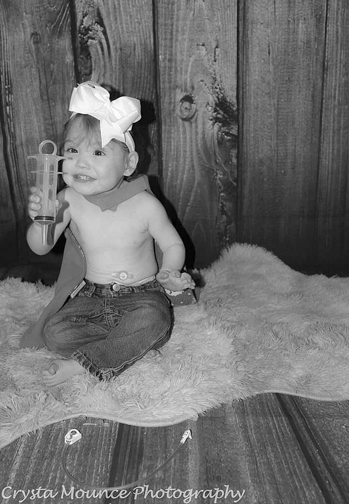 Alijah is registered to the contest to win money with this photo: baby, ballet_tutu, child, costume, dress, hair_accessory, headgear, headpiece, joy, person, photograph, photography, stock_photography, toddler