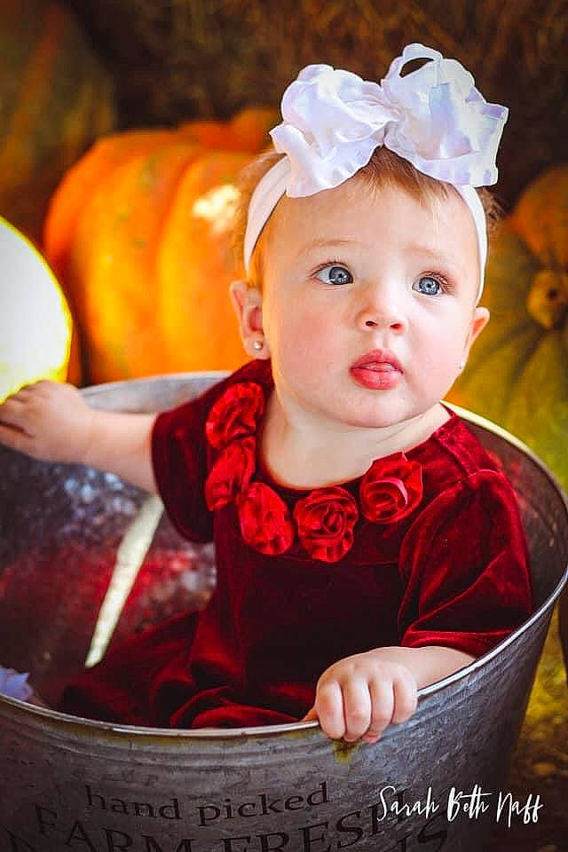 Everleigh joined the competition — help win amazing prizes! baby, baby_toddler_clothing, calabaza, cheek, child, eye, flash_photography, fun, grass, happy, hat, head, human_body, iris, lip, person, pumpkin, sitting, skin, sleeve