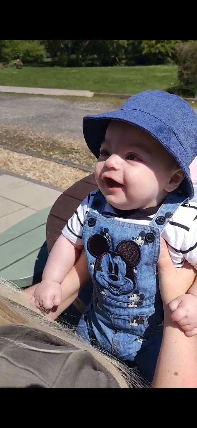 Chester is registered to the contest to win money with this photo: baby, baby_toddler_clothing, cap, child, cool, facial_expression, fun, grass, happy, headgear, headwear, mammal, people, person, skin, sleeve, smile, snapshot, summer, sun_hat