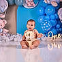baby, balloons, birthday, blue, celebration, child, cute, decorations, first_birthday, floor, happy, indoor, infant, outfit, party, photo_shoot, sign, sitting, smiling, teddy_bear