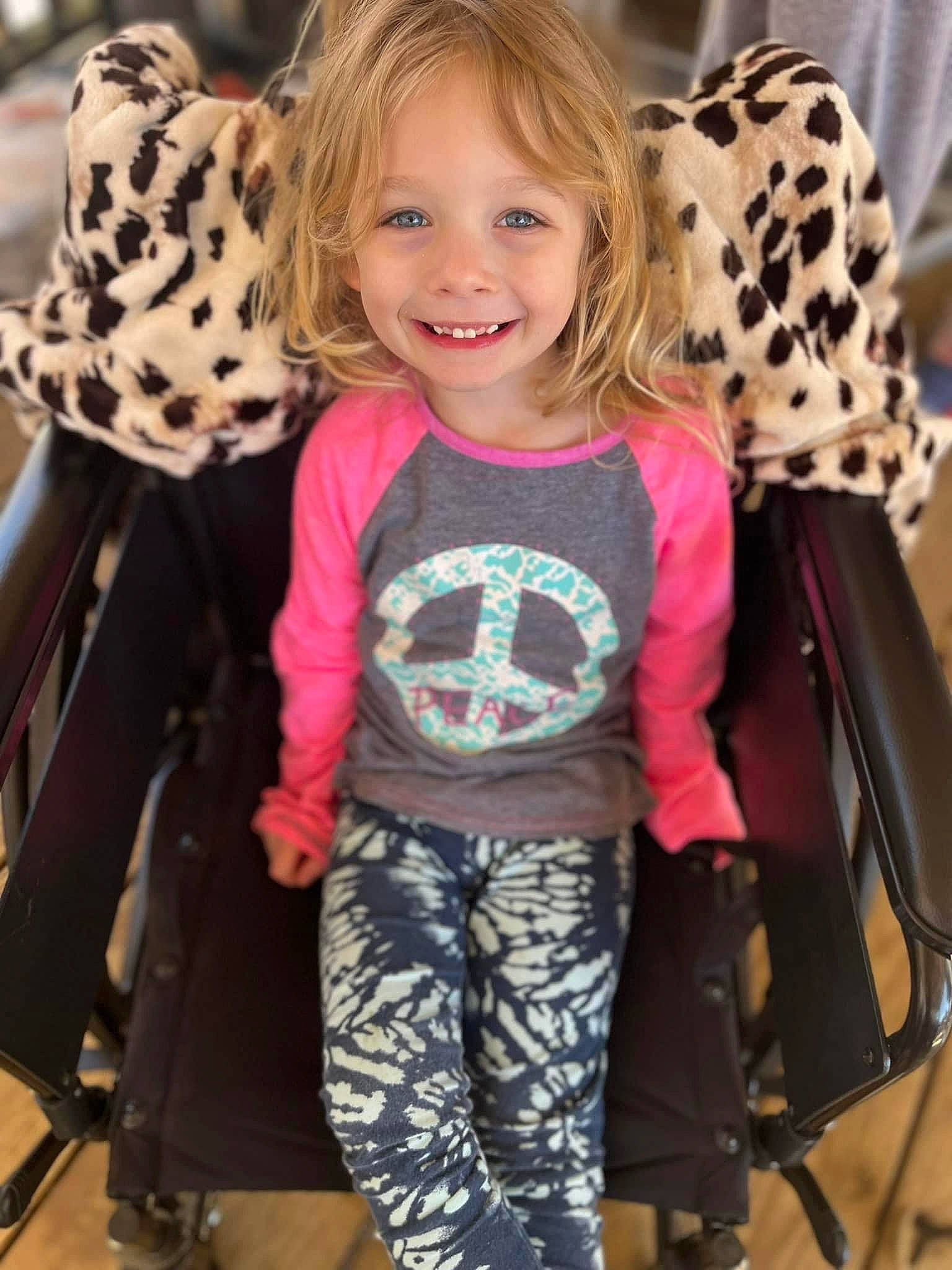 Paisley is registered to the contest to win money with this photo: black, eye, fashion, hair, hairstyle, joint, joy, leg, mammal, neck, organ, outerwear, person, photograph, shoe, shoulder, sleeve, smile, style, vertebrate