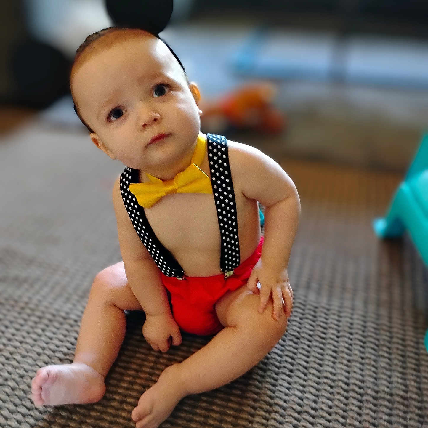 Jeffery joined the competition — help win amazing prizes! baby, bare_chest, black_ears, carpet, child, curious, cute, expression, floor, headband, indoors, infant, person, playful, polka_dot_suspender, red_shorts, sitting, toddler, yellow_bow_tie, young_child