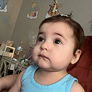 Vivienne joined the competition — help win amazing prizes! toddler, child, baby, blue_shirt, indoor, wall_decals, winnie_the_pooh, curious, person, portrait, looking_up, cute, young_child, decor, furniture, soft_lighting, room, innocence, seated, casual_clothing