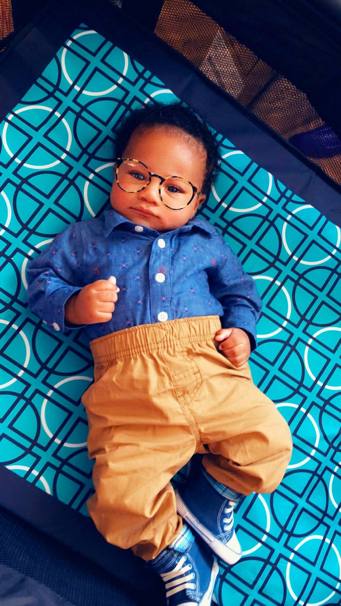Clarence is registered to the contest to win money with this photo: blue, child, cool, fun, glasses, male, pattern, person, toddler