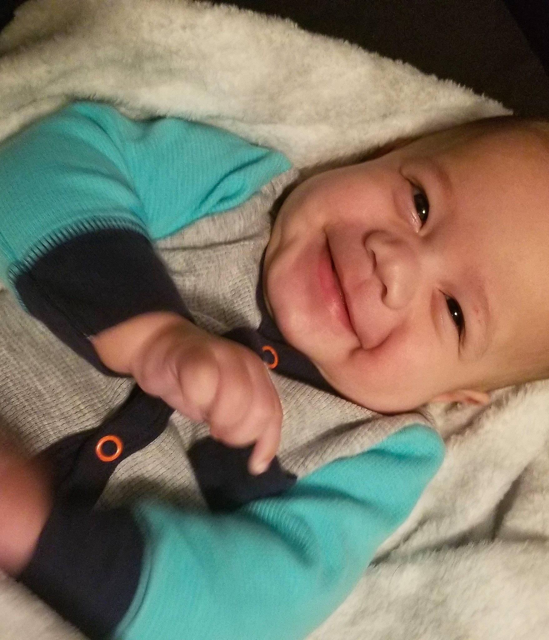 Karter joined the competition — help win amazing prizes! arm, baby, cheek, comfort, eyebrow, finger, gesture, happy, human_body, joy, mammal, mouth, neck, nose, outerwear, person, product, skin, sleeve, smile