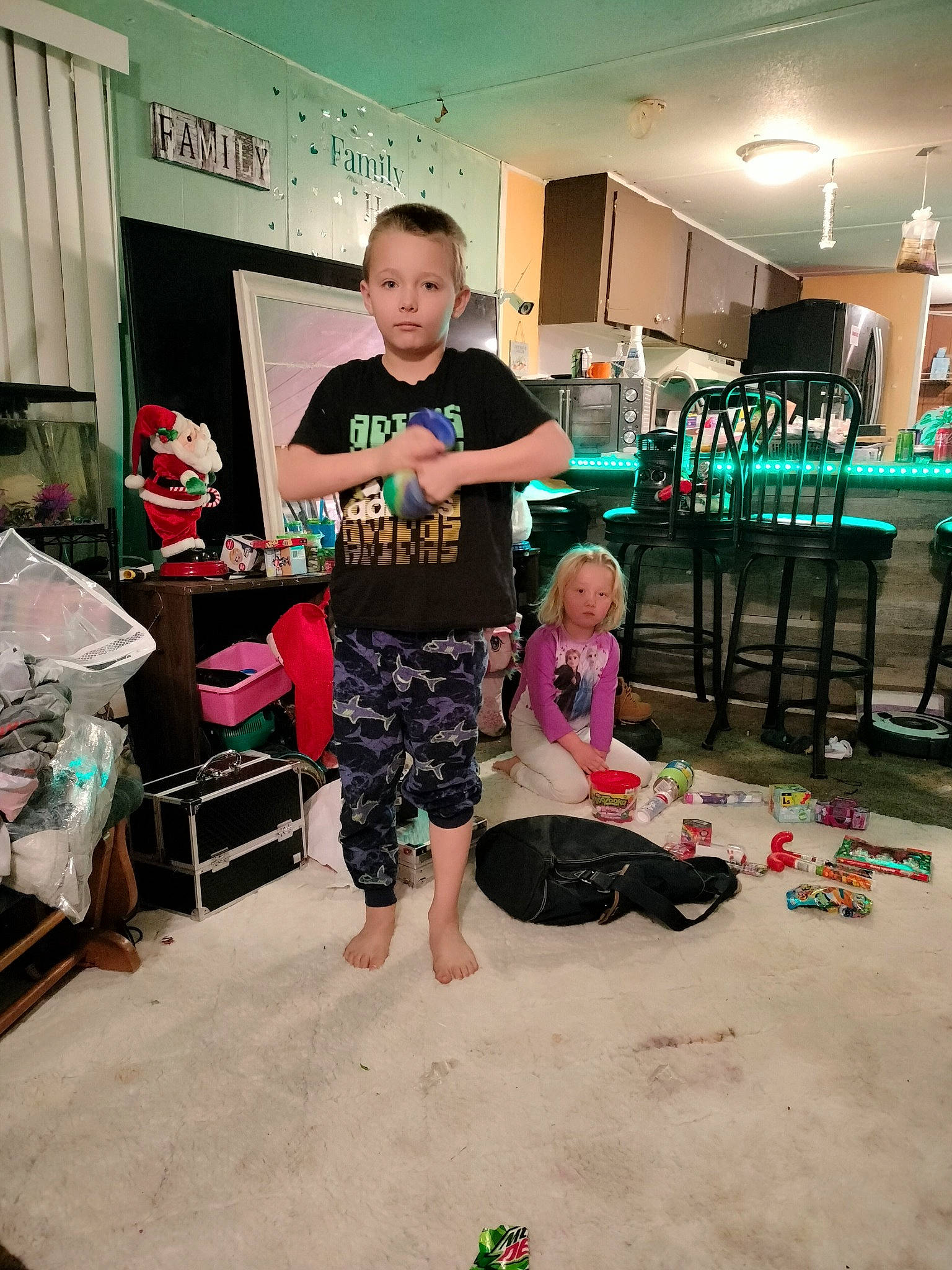 Karter joined the competition — help win amazing prizes! barefoot, box, child, event, flooring, fun, happy, leisure, magenta, person, play, recreation, room, shorts, sitting, sneakers, t_shirt, thigh, toddler, visual_arts