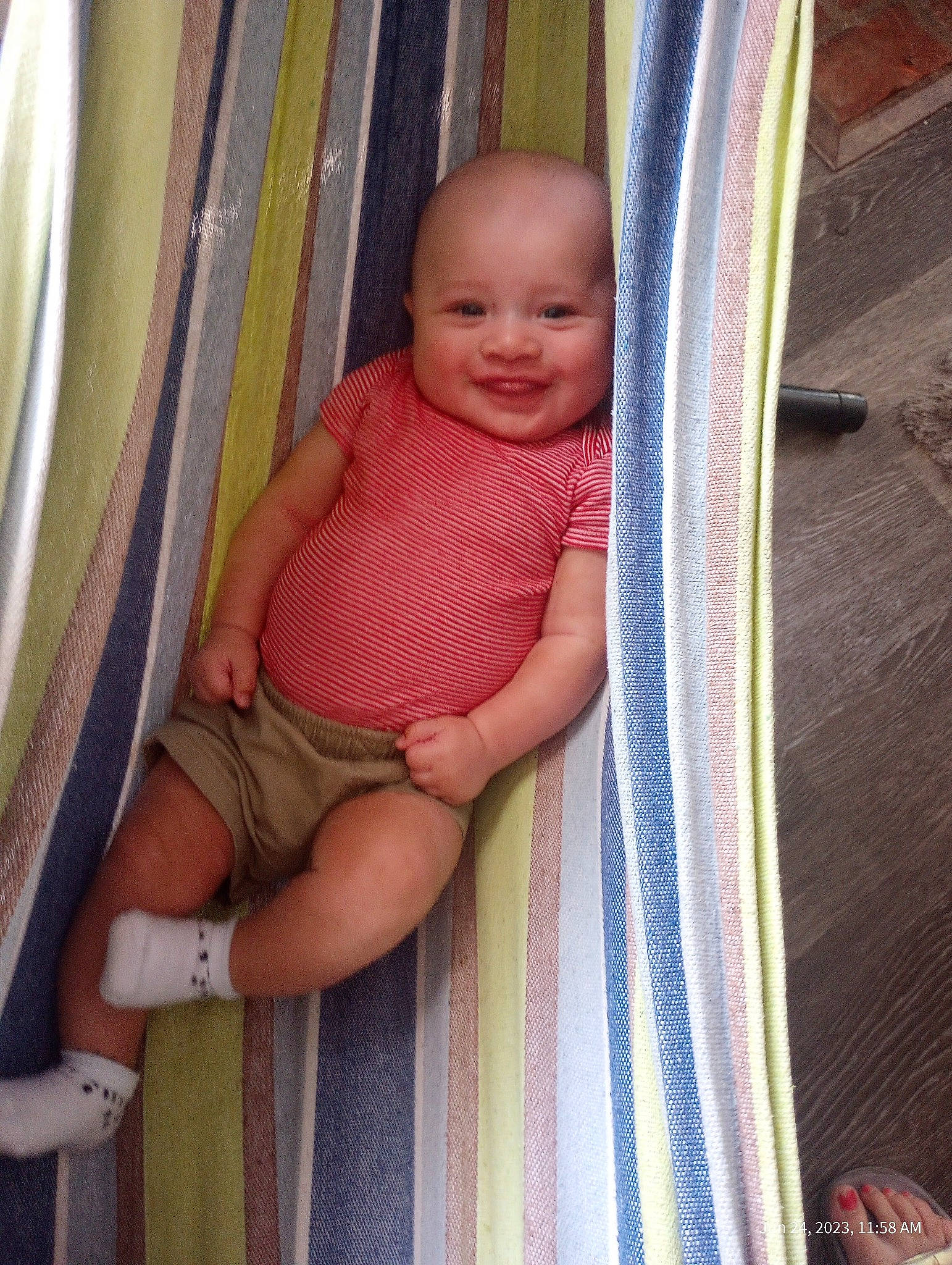 Cain is registered to the contest to win money with this photo: baby, baby_products, baby_safety, baby_toddler_clothing, cheek, child, comfort, eye, eyebrow, infant_bed, joy, linens, pattern, person, product, sitting, skin, smile, textile, thigh