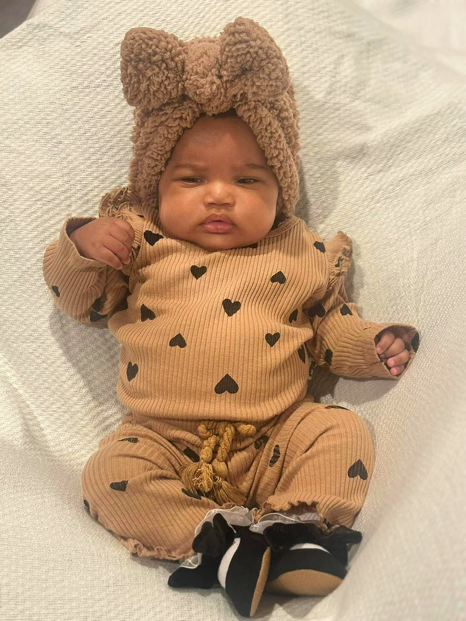 Branniah joined the competition — help win amazing prizes! baby, baby_products, baby_sleeping, baby_toddler_clothing, beige, cap, cheek, comfort, doll, fur, head, headgear, headwear, knit_cap, pattern, person, sitting, sleeve, stuffed_toy, toddler