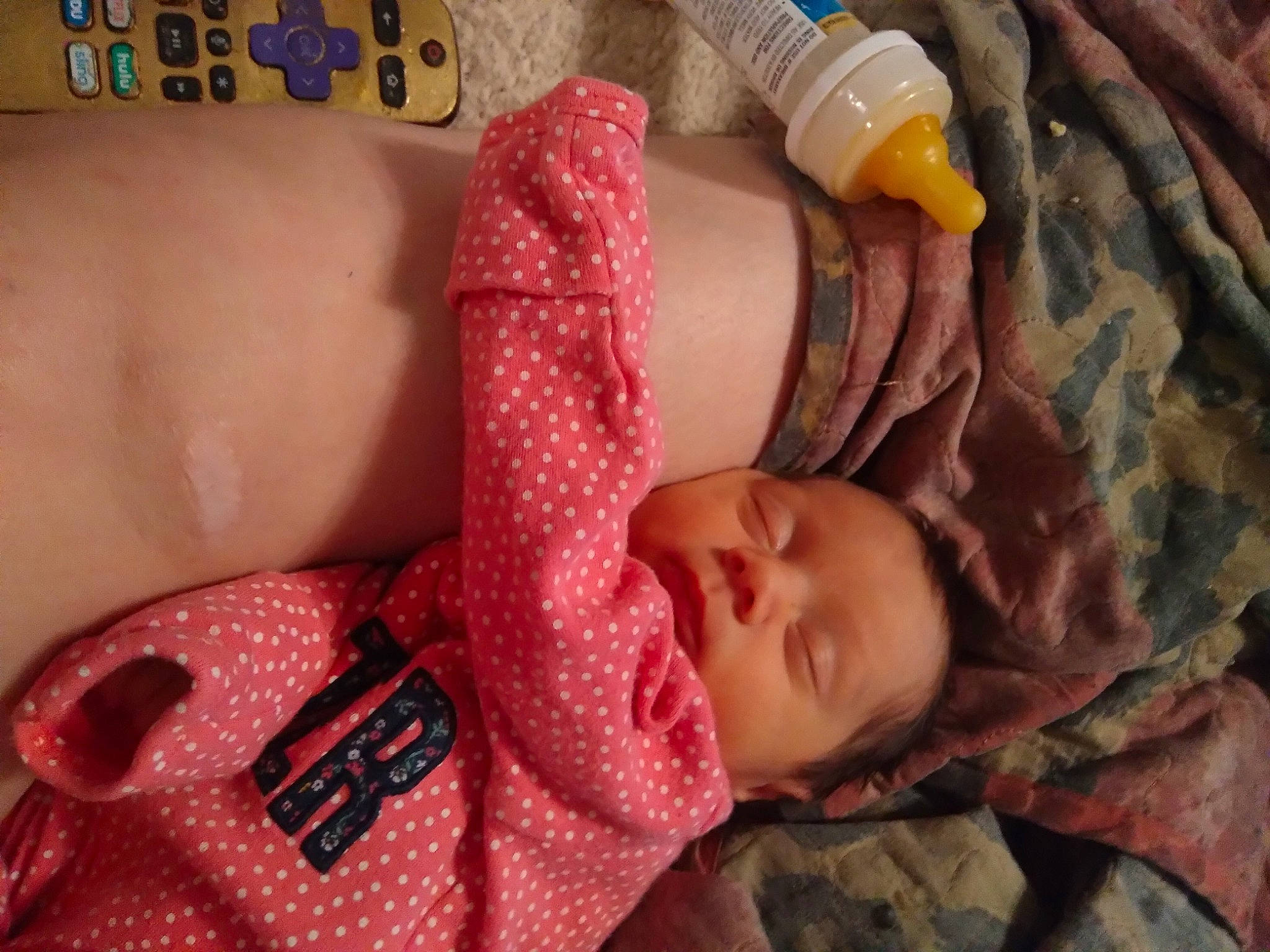 Marianna is registered to the contest to win money with this photo: arm, baby, baby_products, baby_sleeping, baby_toddler_clothing, cheek, child, comfort, finger, human_body, linens, lip, mouth, nail, nose, pattern, person, pink, skin, toddler
