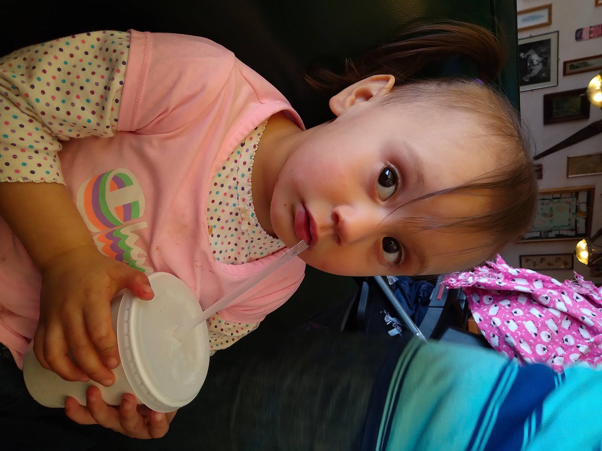 Vaga is registered to the contest to win money with this photo: baby, baby_toddler_clothing, cheek, child, drinkware, drum, ear, elbow, eyelash, food, fun, gesture, happy, iris, nail, nose, person, picture_frame, skin, smile