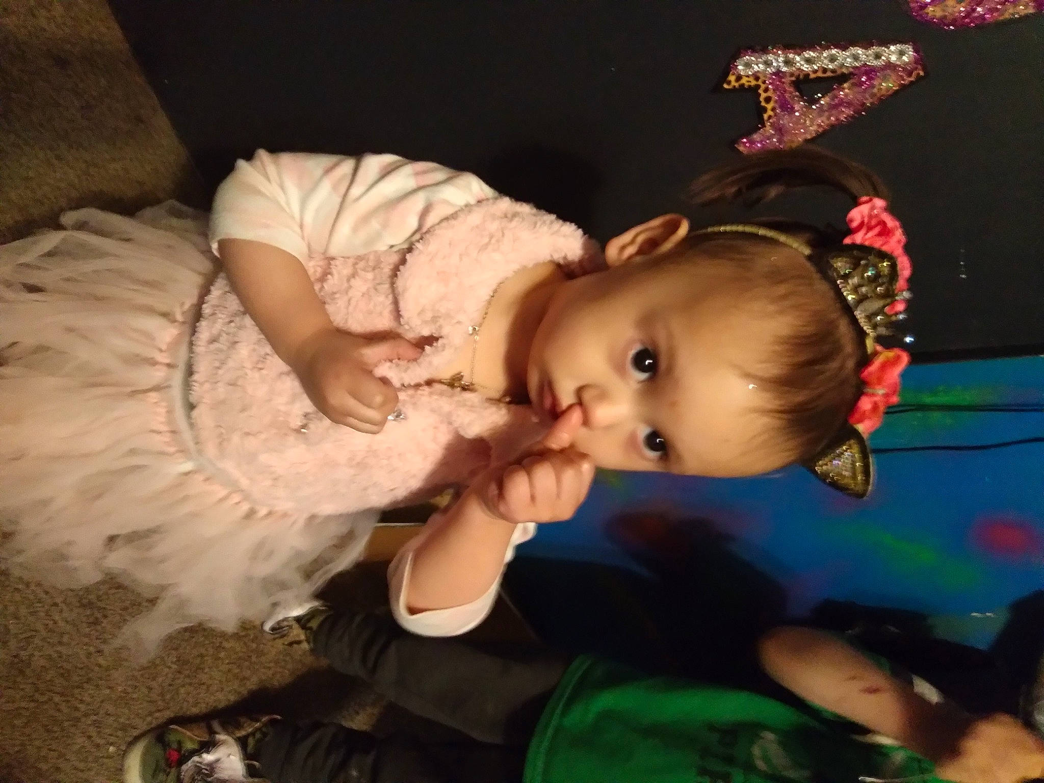 Glorianna is registered to the contest to win money with this photo: baby, baby_products, baby_toddler_clothing, cheek, child, costume, event, fashion_accessory, flash_photography, fun, hair_accessory, happy, hat, headband, headpiece, iris, people, person, sitting, toddler