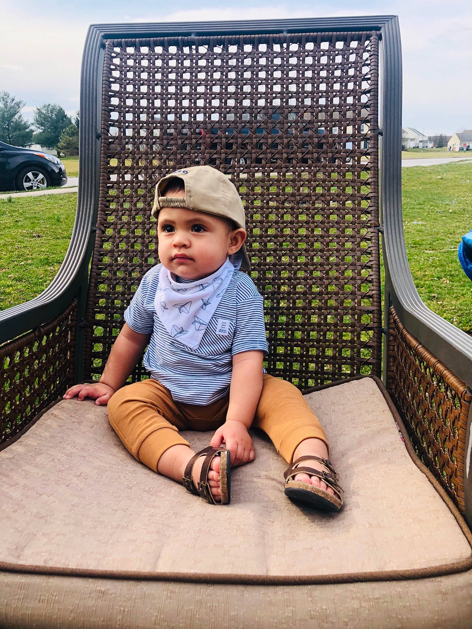 Ramiro joined the competition — help win amazing prizes! child, furniture, grass, headgear, headwear, home, leisure, pattern, person, photography, recreation, shoe, sitting, summer, toddler, vacation