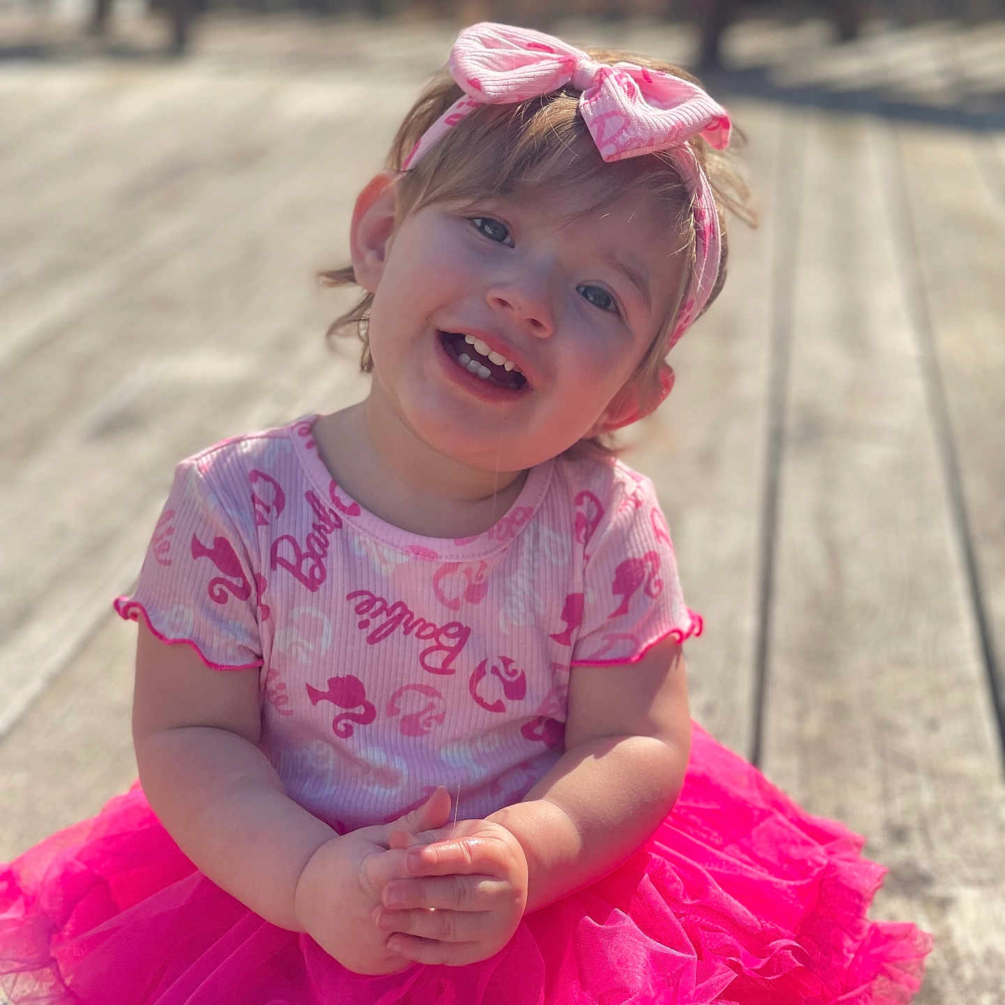 Marselina joined the competition — help win amazing prizes! accessories, architecture, baby, building, clothing, dress, face, happy, head, house, housing, person, photography, portrait, purple, sitting, skirt, water, waterfront, wood