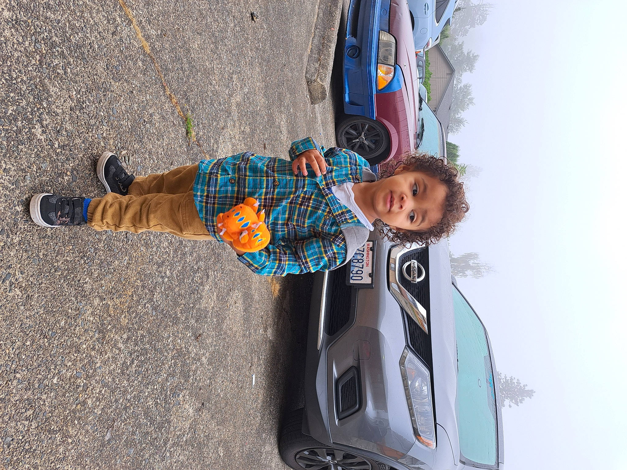 Sir joined the competition — help win amazing prizes! asphalt, automotive_design, automotive_exterior, automotive_lighting, bumper, car, electric_blue, family_car, hood, human_leg, outdoor_shoe, person, recreation, sky, smile, tire, toddler, travel, vehicle, vehicle_door