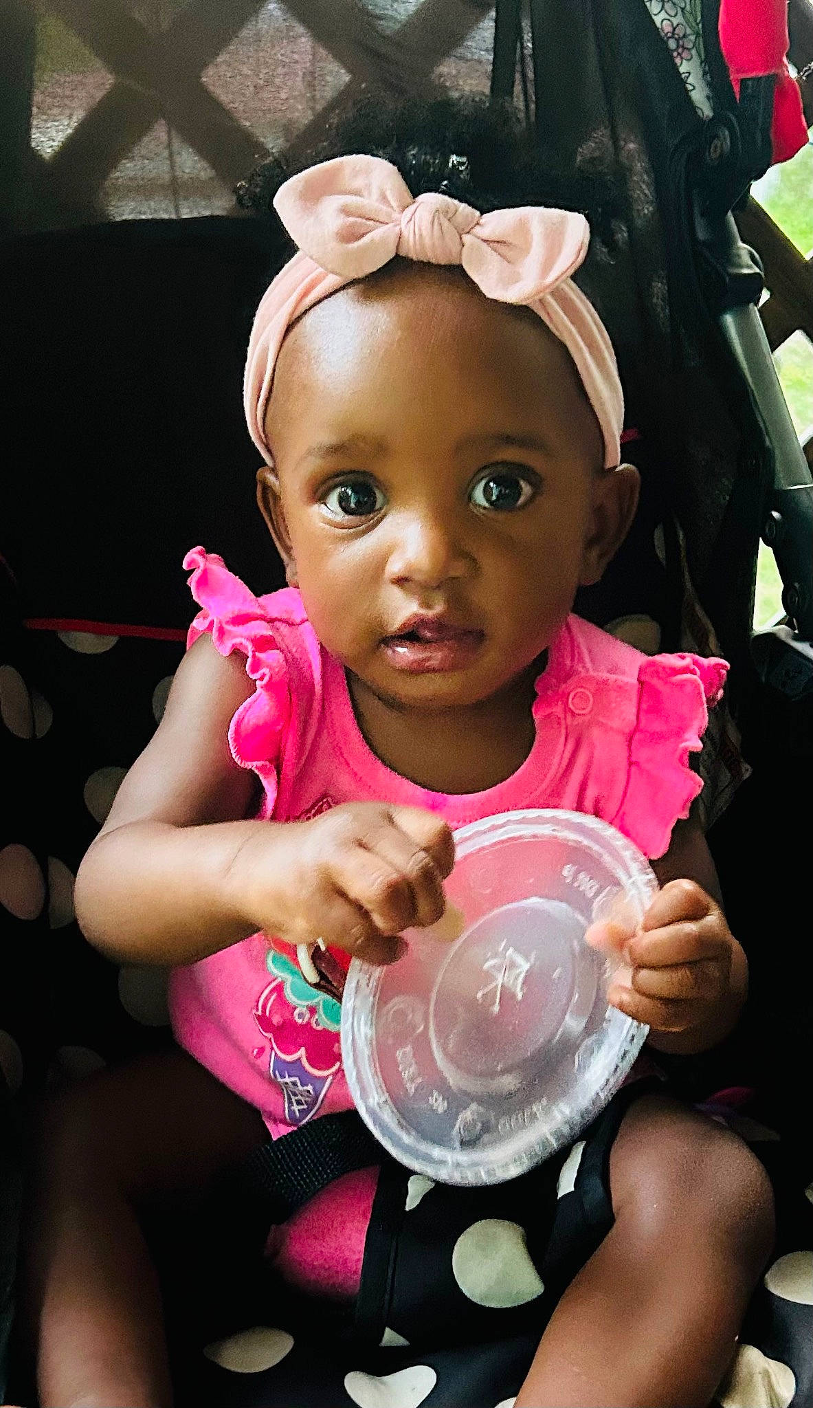 Ayanna is registered to the contest to win money with this photo: baby_toddler_clothing, cheek, child, cool, eyelash, fun, gesture, hand, happy, jewellery, lip, magenta, mouth, nail, person, pink, sitting, skin, thumb, toddler
