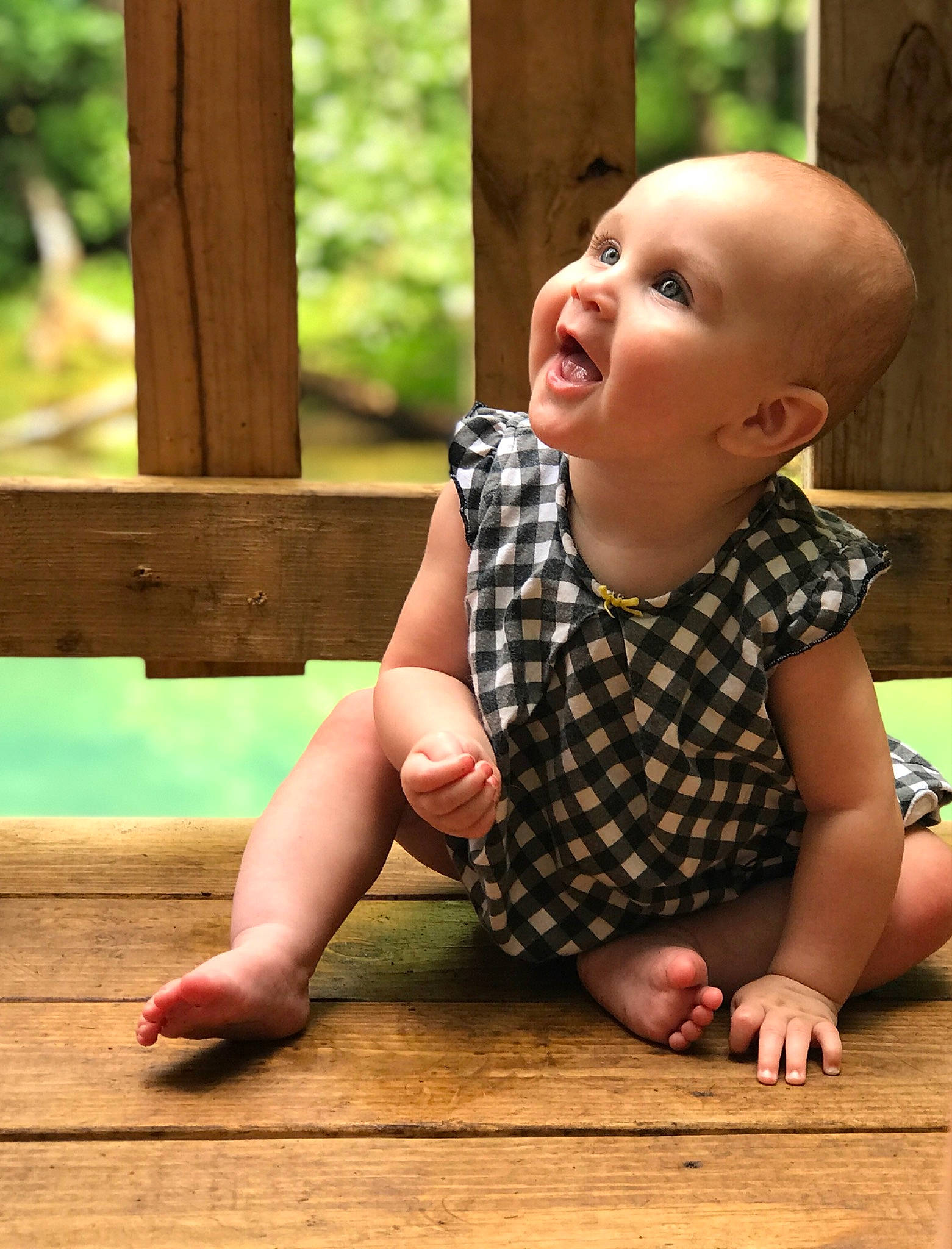 Maleah is registered to the contest to win money with this photo: arm, baby, baby_toddler_clothing, chin, finger, floor, flooring, fun, grass, happy, hardwood, leaf, leisure, nose, person, skin, smile, standing, summer, toddler
