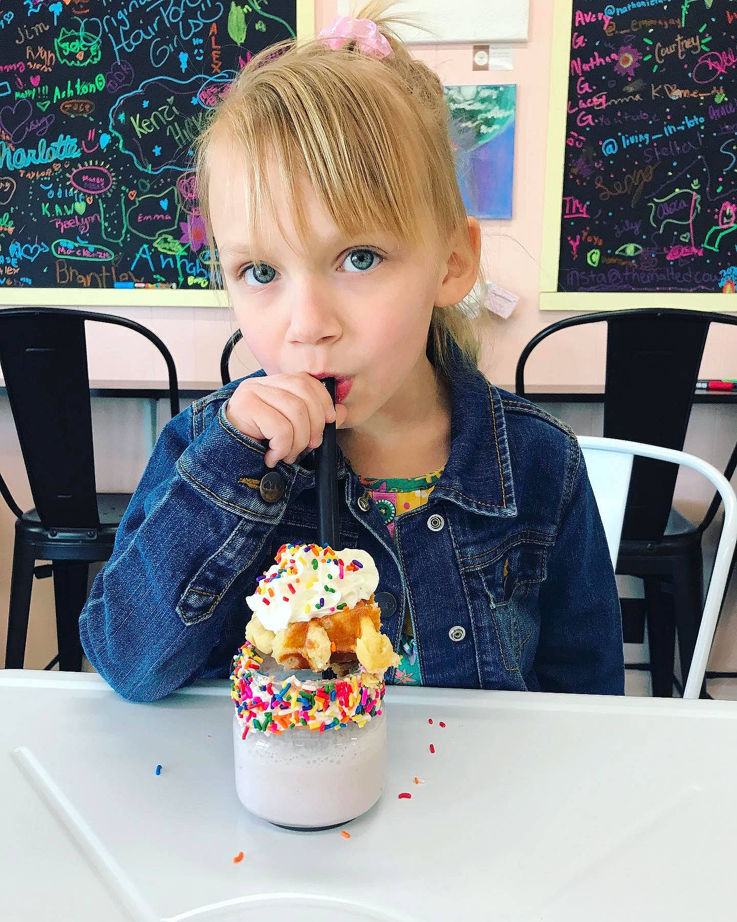 Kinsleigh is registered to the contest to win money with this photo: baking, chair, child, comfort_food, cuisine, desk, drink, drinkware, event, food, food_craving, ice_cream, party, person, picture_frame, serveware, sweetness, t_shirt, table, tableware