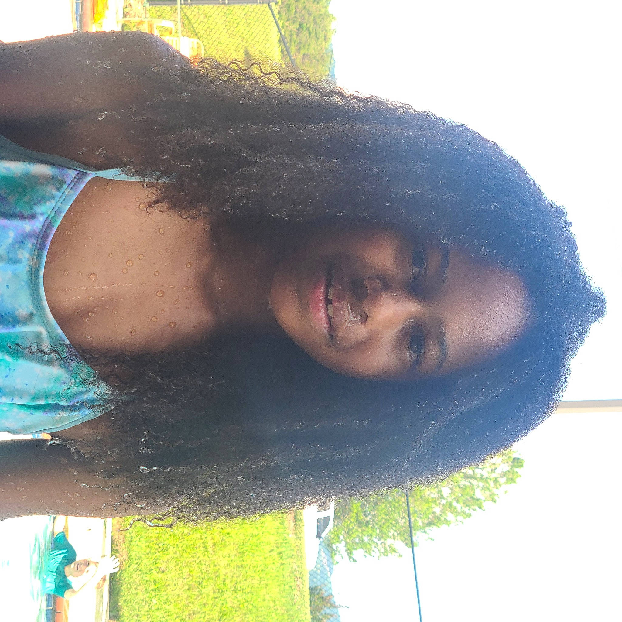 Nicole is registered to the contest to win money with this photo: black, black_hair, blue, brown_hair, cool, fun, grass, happy, joy, leisure, lip, long_hair, neck, people_in_nature, person, photograph, selfie, sunlight, swimwear, thigh