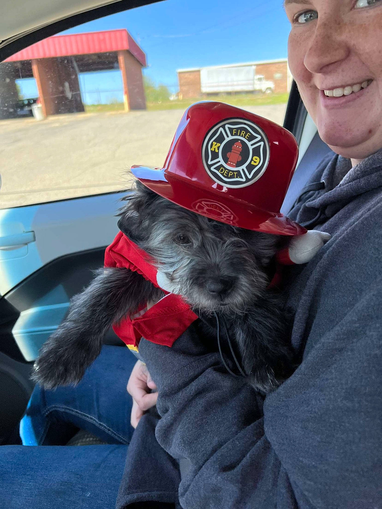 Oakley joined the competition — help win amazing prizes! automotive_exterior, baseball_cap, cap, carnivore, companion_dog, costume_hat, dog, dog_breed, electric_blue, fashion_accessory, fur, hat, motor_vehicle, personal_protective_equipment, sitting, sky, smile, snout, sporting_group, vehicle_door