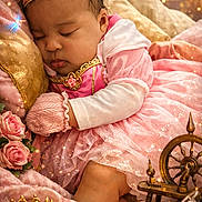 Nylah joined the competition — help win amazing prizes! baby, sleeping_baby, princess, tiara, pink_dress, knit_mitten, roses, pillow, blanket, fairytale, sparkles, crown, glass_slipper, spinning_wheel, book, soft_lighting, portrait, newborn, curly_hair, cozy