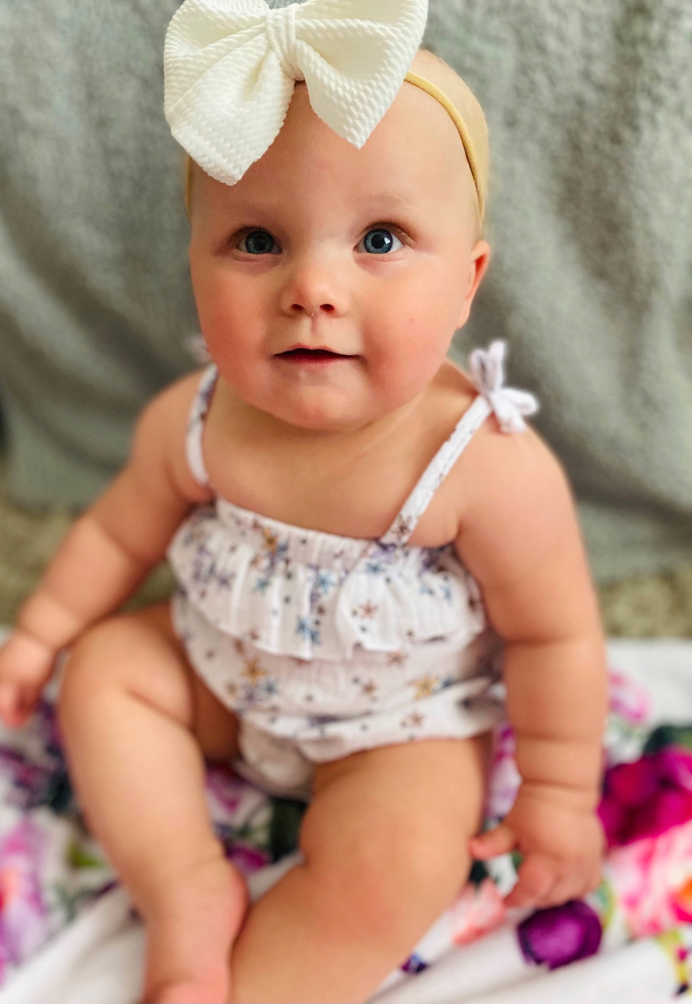 Mykenna joined the competition — help win amazing prizes! baby, baby_toddler_clothing, cap, cheek, clothing, costume_hat, dress, eye, face, happy, head, headwear, iris, person, photograph, pink, purple, skin, sleeve, smile