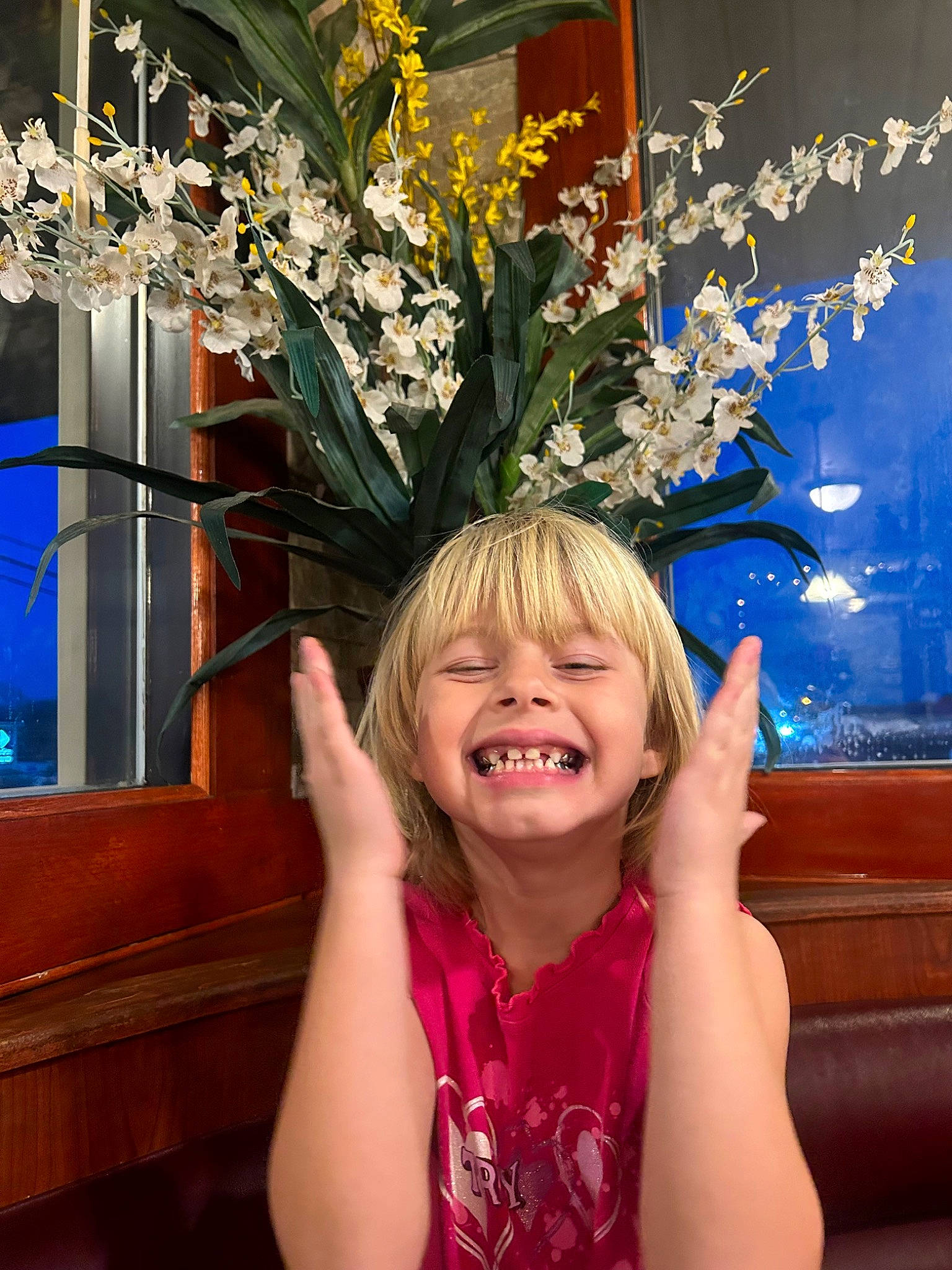 Savannah is registered to the contest to win money with this photo: artificial_flower, beauty, blue, bouquet, branch, electric_blue, event, flower, flower_arranging, fun, gesture, happy, iris, joy, lighting, person, petal, plant, smile, tree