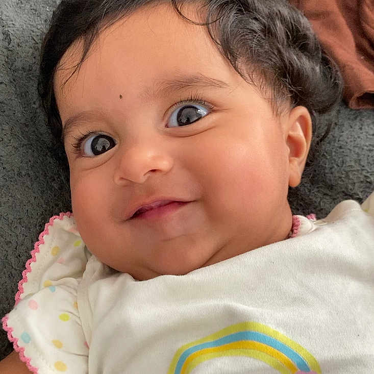Vyshali joined the competition — help win amazing prizes! accessories, baby, blanket, bodypart, earring, face, happy, head, jewelry, laughing, mouth, newborn, person, photography, portrait, quilt, selfie, shoulder, smile, teeth