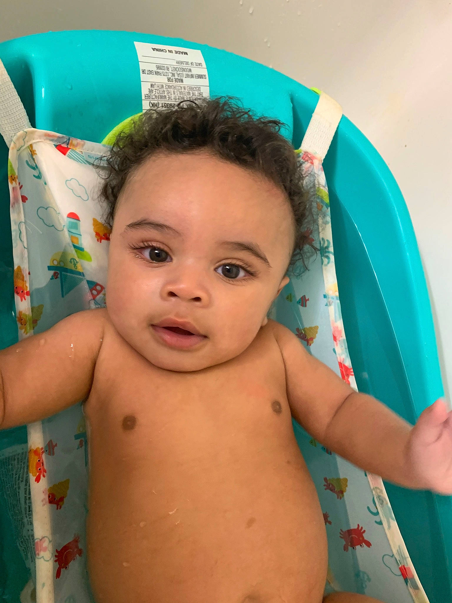 Karson is registered to the contest to win money with this photo: baby, bathing, cheek, chest, child, ear, eye, face, forehead, fun, head, person, skin, toddler