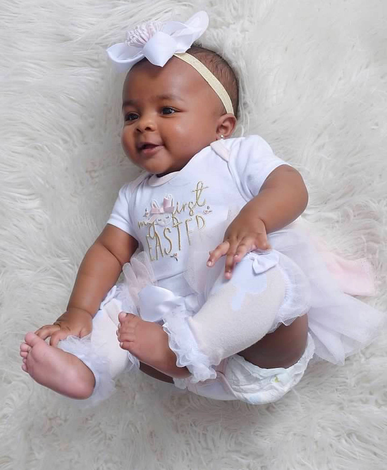 Payton joined the competition — help win amazing prizes! baby, baby_toddler_clothing, cap, child, clothing, fashion_accessory, finger, hair_accessory, happy, headband, headgear, headpiece, human_body, linens, person, pink, skin, sleeve, smile, toddler
