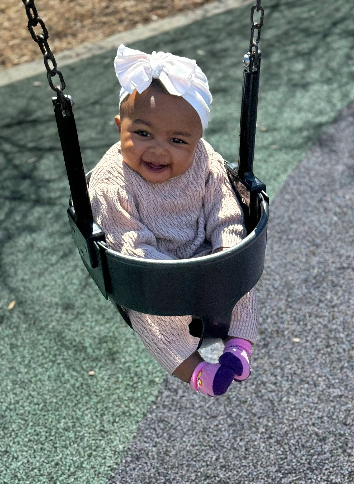 Payton joined the competition — help win amazing prizes! baby, baby_products, baby_toddler_clothing, child, city, fun, grass, happy, hat, headwear, leisure, people_in_nature, person, play, playground, public_space, recreation, sitting, smile, swing