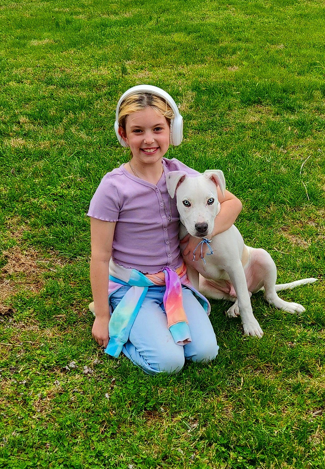 Hank is registered to the contest to win money with this photo: carnivore, companion_dog, dog, dog_breed, fawn, fun, grass, grass_family, grassland, happy, hat, lawn, leisure, meadow, people_in_nature, plant, recreation, smile, sun_hat, t_shirt