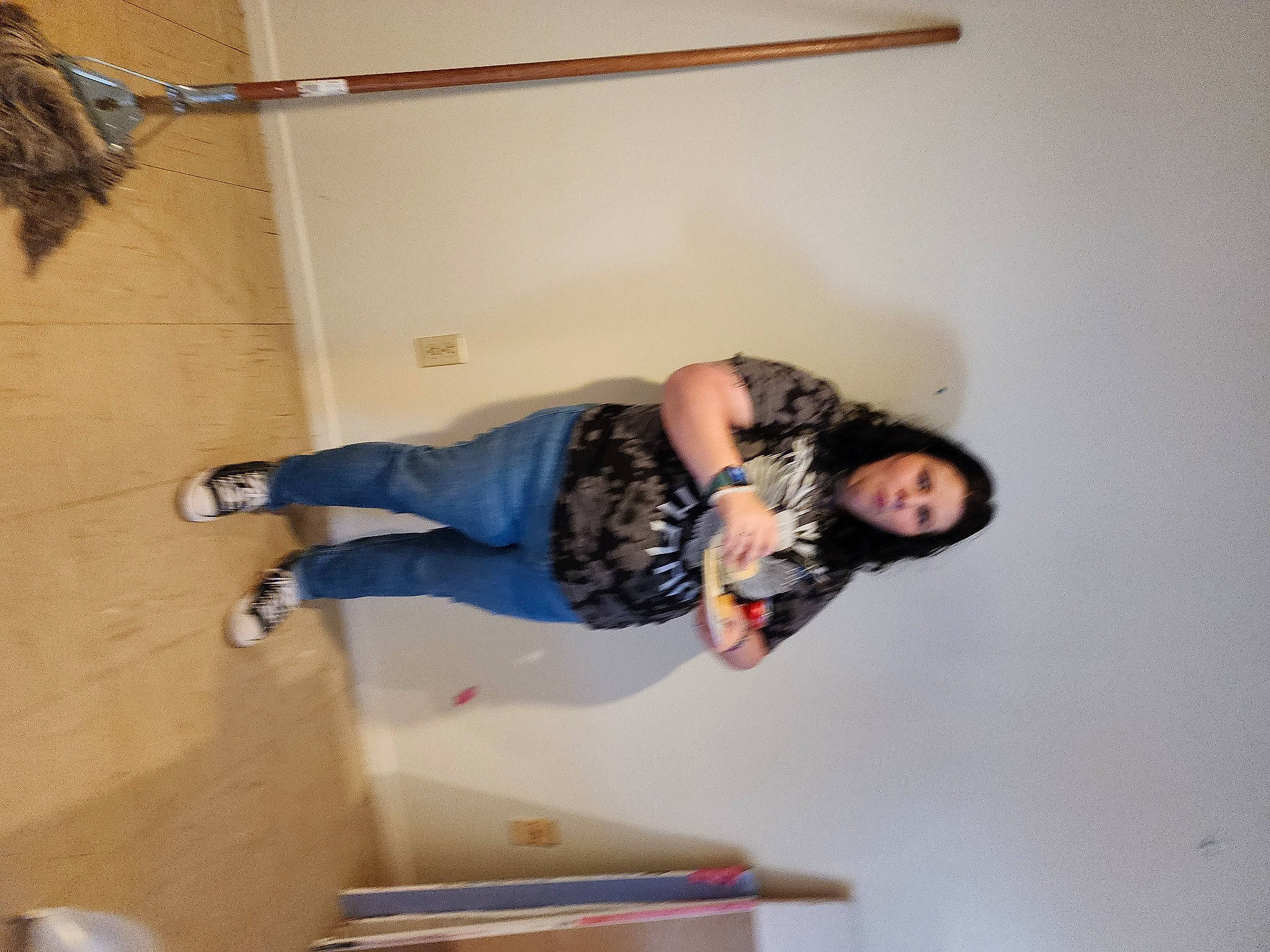 Tabius is registered to the contest to win money with this photo: boot, ceiling, comfort, elbow, floor, flooring, fun, hardwood, human_leg, knee, outdoor_shoe, person, plaster, room, stairs, t_shirt, thigh, waist, walking_shoe, wood