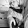 Frankie joined the competition — help win amazing prizes! baby, infant, hat, pom_pom, striped_clothing, holding_hands, nursery, animal_wall_decals, lion, zebra, giraffe, bed, blanket, adult_hand, black_and_white, portrait, cute, cozy, indoor, child