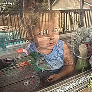 Merrick joined the competition — help win amazing prizes! background, child, clothing, curious, daylight, deck, face, fence, home, house, outdoor, person, play, portrait, railing, reflection, toddler, toy, tractor, window_screen