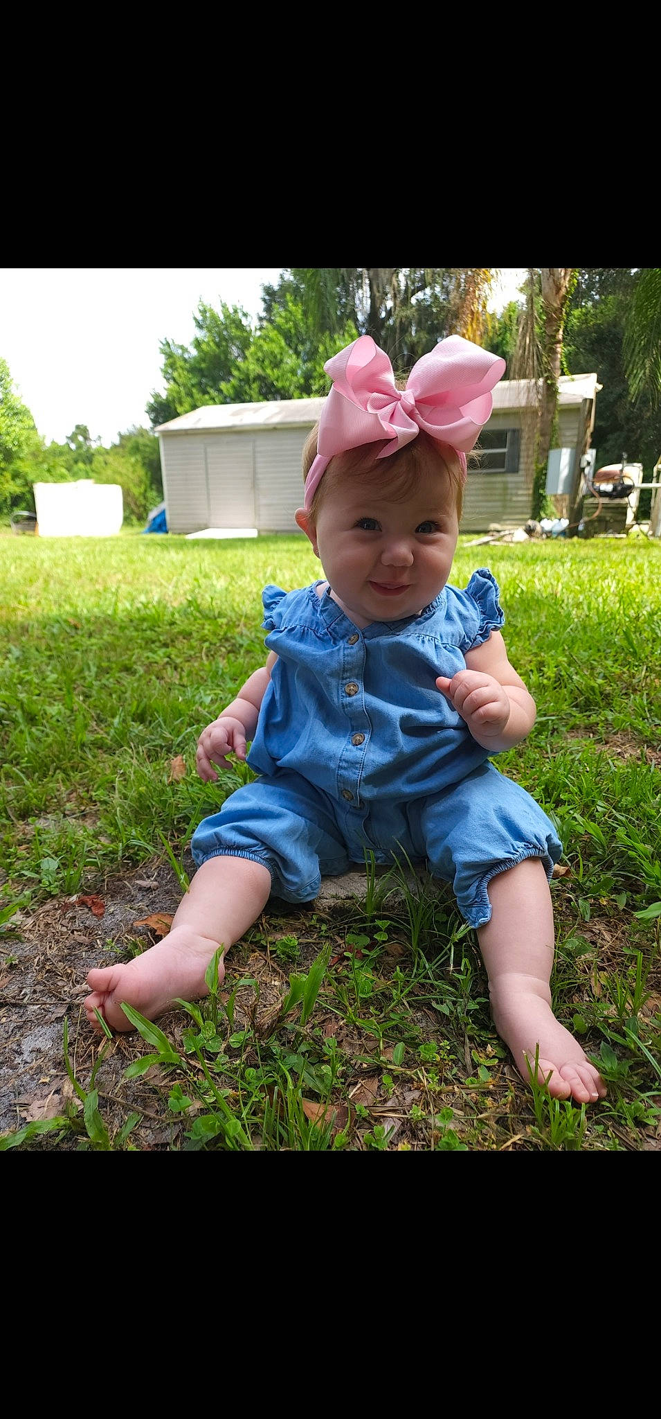 Georgia joined the competition — help win amazing prizes! baby, baby_toddler_clothing, barefoot, fun, grass, grassland, happy, hat, lawn, leisure, people_in_nature, person, pink, plant, recreation, sitting, summer, sun_hat, t_shirt, toddler