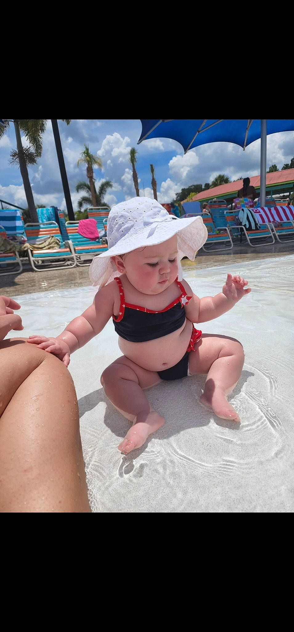 Georgia joined the competition — help win amazing prizes! baby, beach, body_of_water, cap, cloud, fun, happy, hat, headwear, leisure, people_on_beach, person, pink, recreation, sand, shorts, skin, sky, sun_hat, swimwear